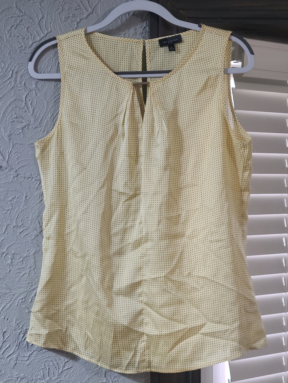 yellow and white polka dot Sleeveless Blouse by The Limited in size Medium